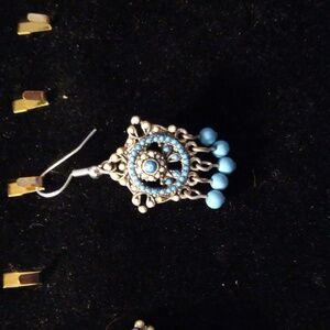 Beautiful turquoise color beads all over these earrings. Give off Navajo vibe.